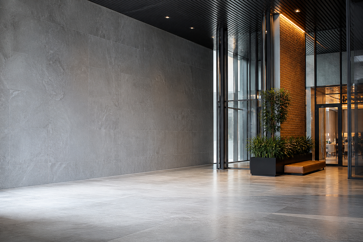 Commercial lobby with tall windows and a polished floor